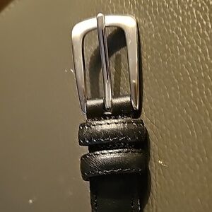 Black leather belt‎ size XL. Silver buckle.  Very good used condition.